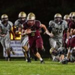 Cougars overwhelm Titans in downpour, move to 3-2