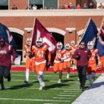 Holston scores 3 TDs, Virginia Tech trips up Liberty 23-22