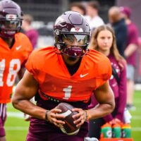 Kyron Drones runs the option during spring practice.