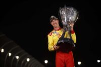 Joey Logano and trophy copy