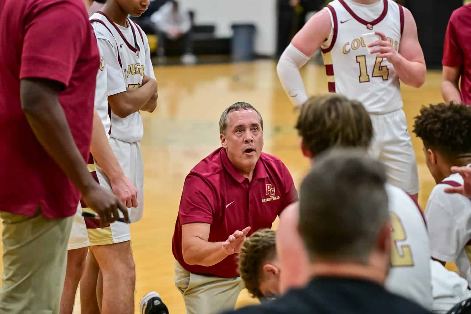 DSC 7388 Anthony huddle scaled