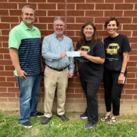 PCPS Education Foundation Makes Donation to Summer Book Bus Program
