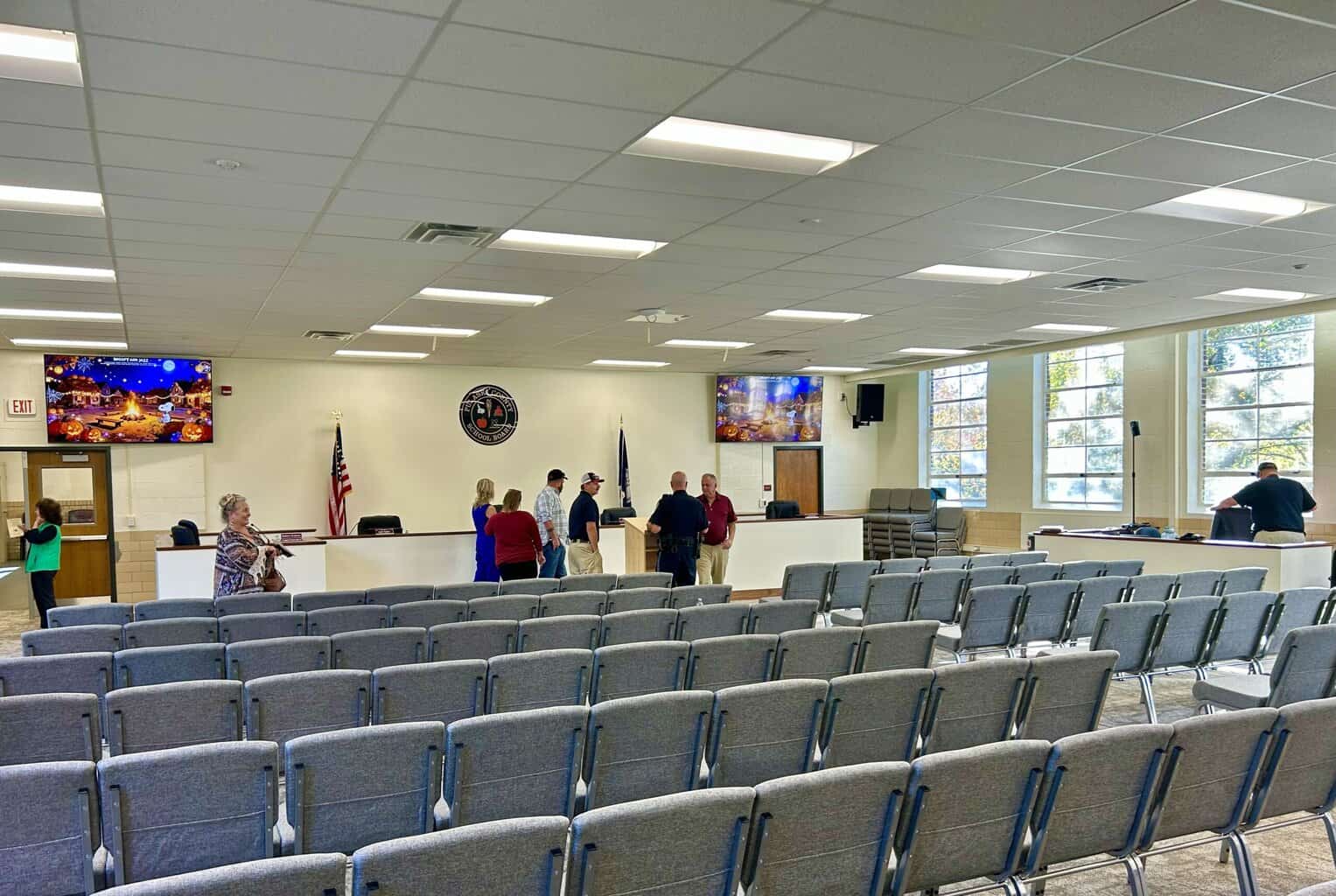 School board cuts ribbon for Northwood Office 2 10 17 School Board room scaled