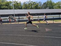 5-22 Senior Tanner Linkous struck gold, etching his name into the record books, winning the 400m dash in a meet record time of 50.37.