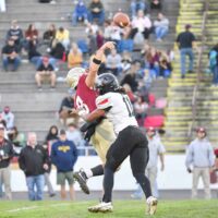 Pulaski quarterback Preston Marshall (8) gets hit as he throws a pass on the Cougar's first offensive play, resulting in a interception. (Brian Bishop/The Patriot